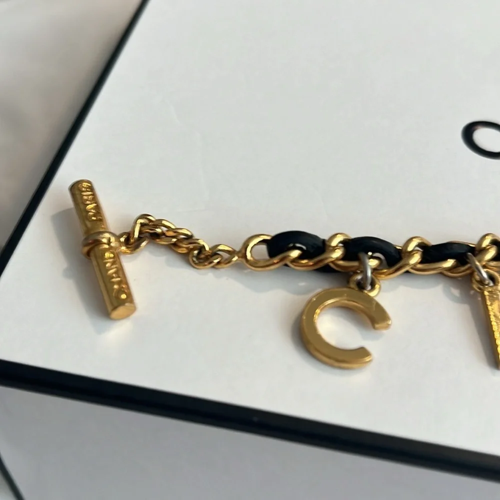 CHANEL RARE VINTAGE TOGGLE LEATHER CHARM BRACELET